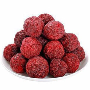 Freeze dried bayberry overview, deep red whole berries with signature bumpy texture