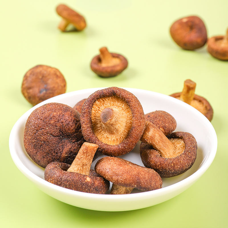 acuum fried shiitake mushroom in bowl, premium Asian snack presentation