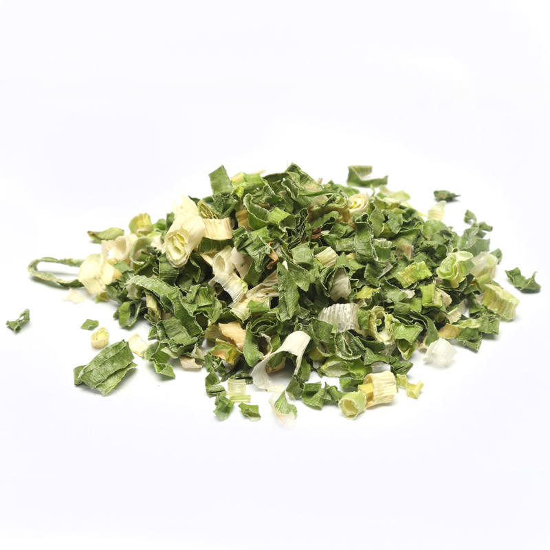 Dehydrated green onion cuts on white background, food-grade quality from China supplier