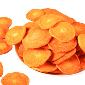 Vacuum fried carrot chips overview, vibrant orange round slices from VF process