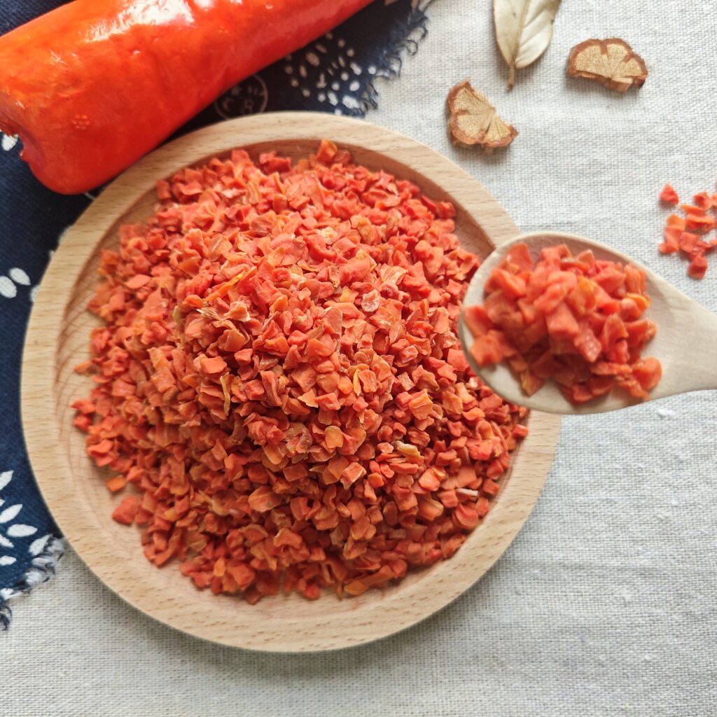 Bulk dehydrated carrot granules with bright orange color supplied by GuoJu Foods